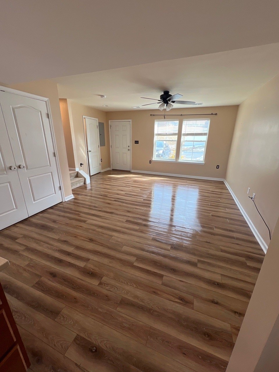 empty living room with clean floors ready after move out cleaning